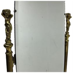 Late 20th century gilt metal cheval mirror, oval bevelled mirror on reeded supports with putti finials 
