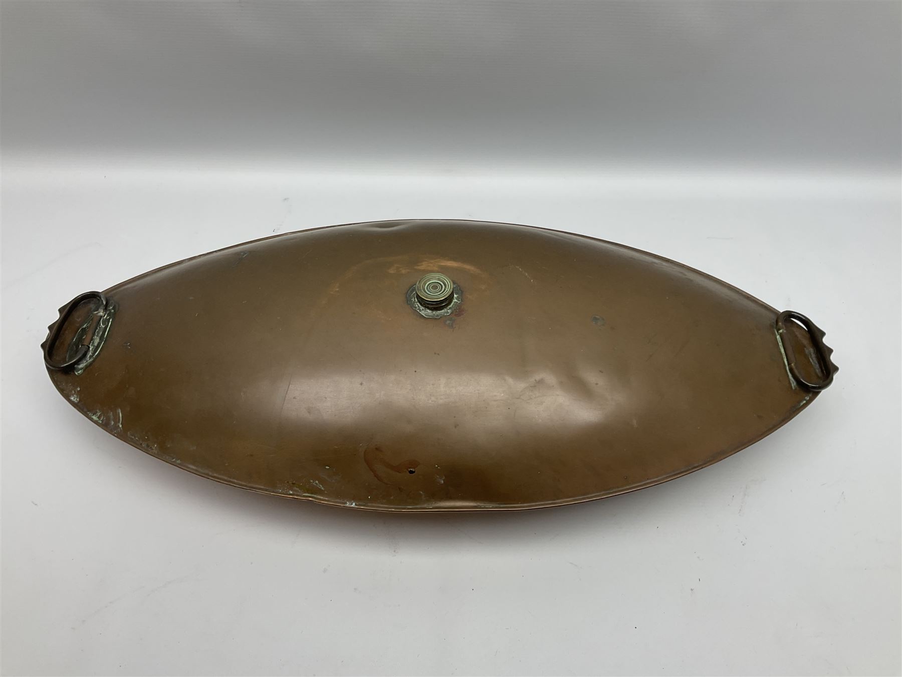 Victorian copper carriage foot warmer of flattened oval form with two carrying handles, L70cm