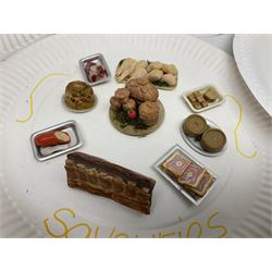 Collection of miniature dolls house food and produce, to include shop display branded packaged examples, afternoon tea, savouries, sweets, tins, jars etc, approximately 160 in total, together with various garden and bech furniture and accessories, plant pots, deck chairs etc