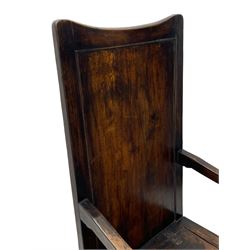18th century elm box-seat lambing chair, dished cresting rail over panelled back, panelled hinged lid flanked by two turned arm supports