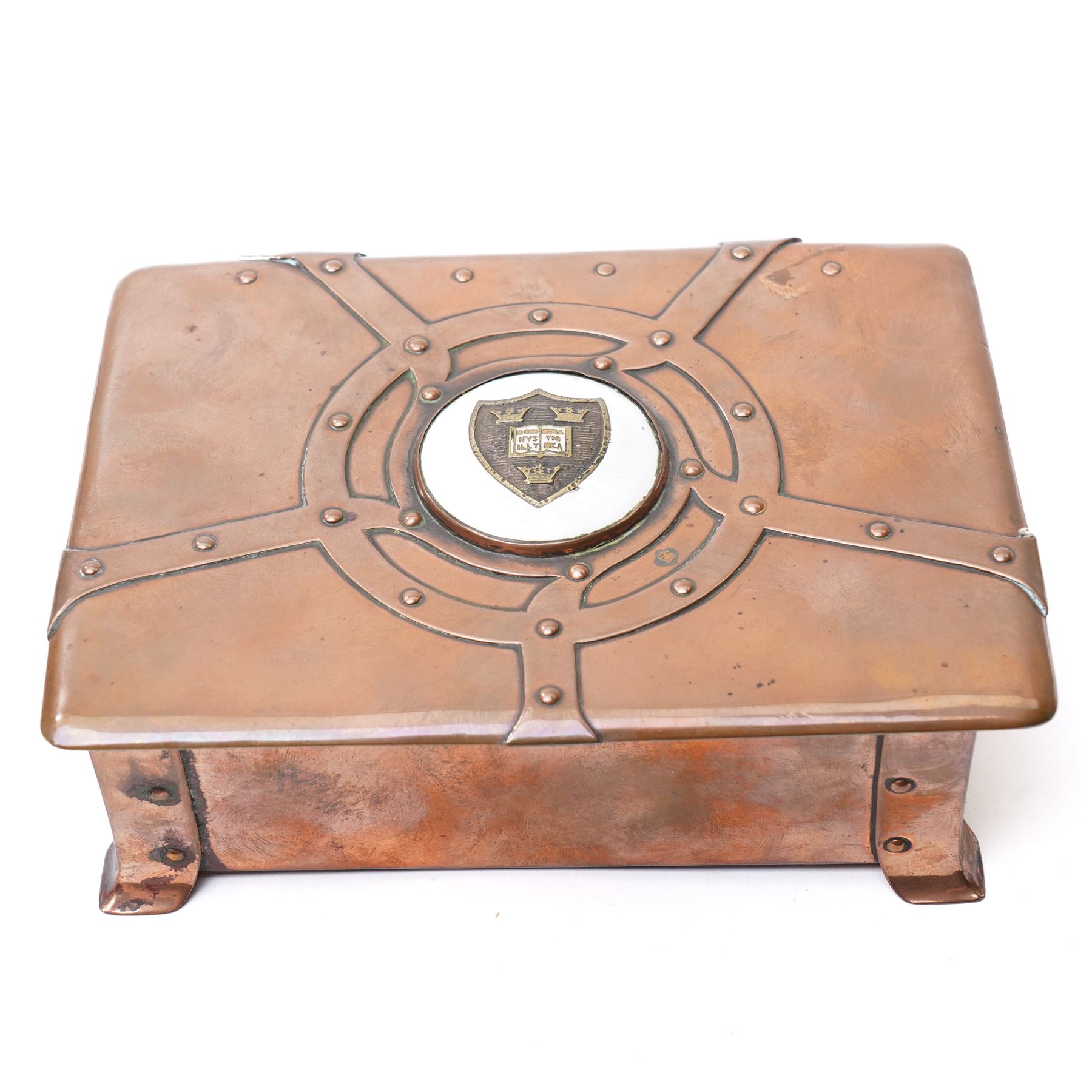 Albert Edward Jones (1878-1954) Arts & Crafts period copper box, the cover with inlaid brass Oxford University coat of arms, 11cm x 15cm 