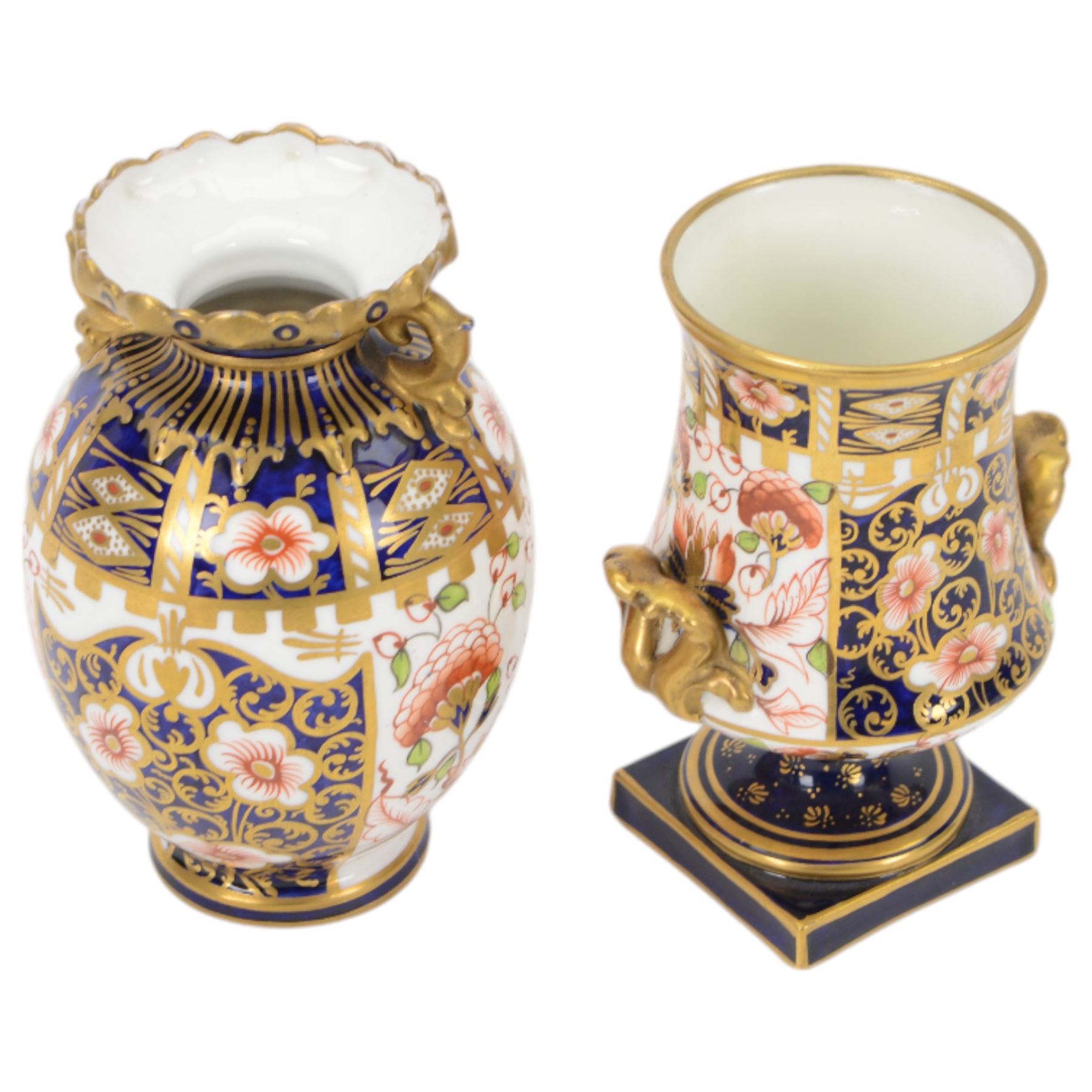 Four Royal  Crown Derby vases in imari patterns, including baluster vase with fluted rim in pattern no 6299, twin handled vase on a square base etc 