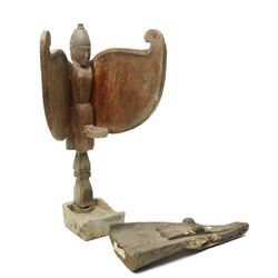 East-Java winged oil lamp, dlupak/ celupak, H64cm and a canoe prow from Sepik river, Papua...
