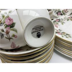 Wedgwood Hathaway Rose pattern tea and dinner wares, comprising twelve saucers, sixteen teacups, twenty tea plates, jug, sucrier, thirteen shallow bowls, sauce boat and saucer, two lidded tureens, larger jug, ten dinner plates, nine smaller plates and two large oval serving dishes