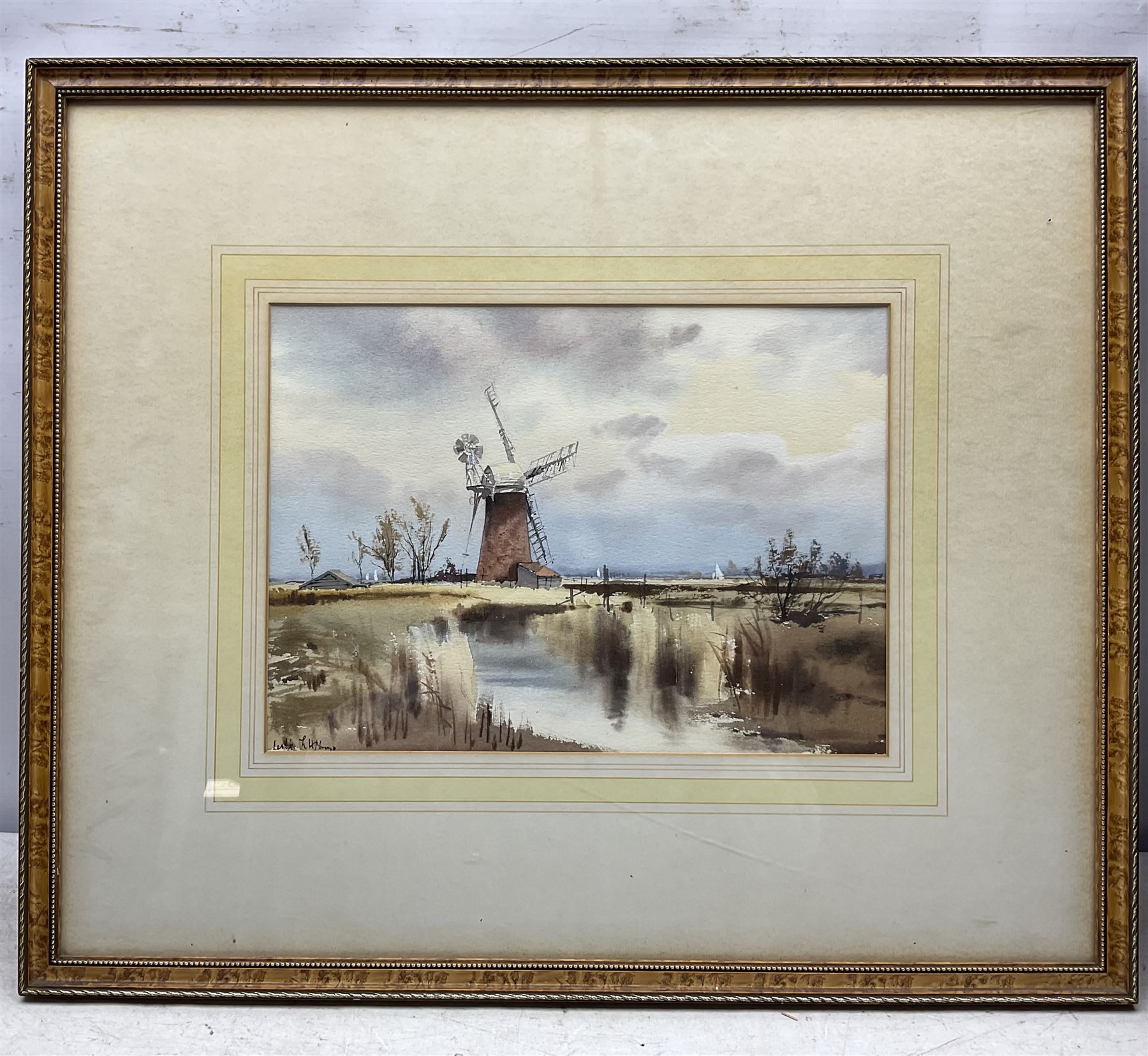 Leslie L Hardy Moore (British 1907-1997): Windmill on the Flatlands, watercolour signed 27cm x 37cm 