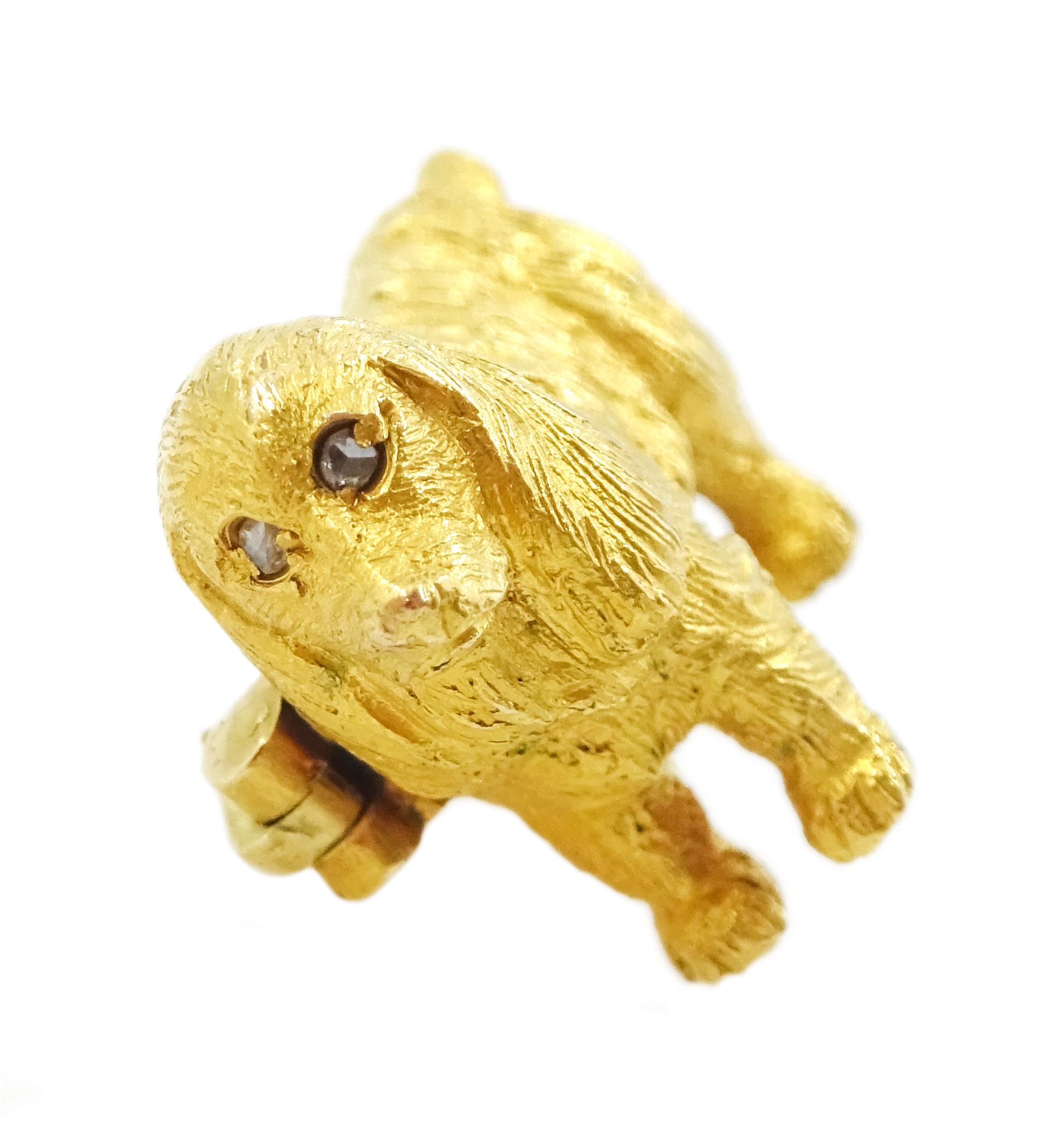 Early 20th century 18ct gold spaniel dog brooch, set with rose cut diamond eyes