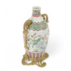 Chinese Famille Rose bottle neck vase, decorated in polychrome enamels with flowering and fruiting vines, with ormolu style gilt metal mounts, H20cm