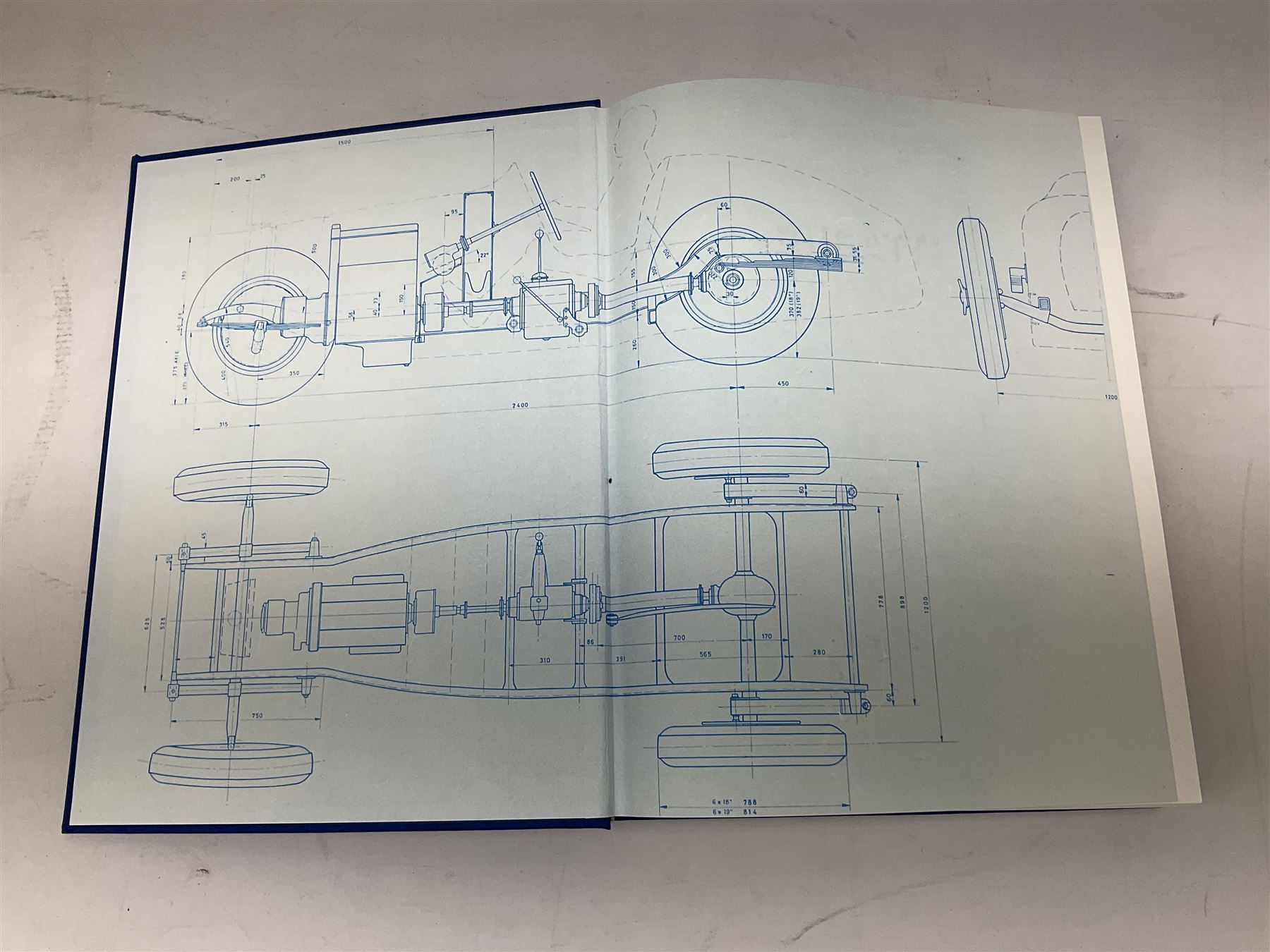 Bugatti Magnum by Hugh Conway and Maurice Sauzay, pub. Foulis Haynes 1989, with original engine turned slipcase with gilt metal label bearing 'Ettore Bugatti Molsheim Alsace', chassis no. 1636, the blue cloth bound book with monochrome and colour plates, limited edition of 2,000