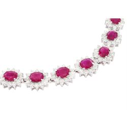 18ct white gold ruby and diamond necklace, thirty-seven oval cut ruby and round brilliant cut diamond clusters, total ruby weight approx 23.25 carat, total diamond weight approx 11.85 carat