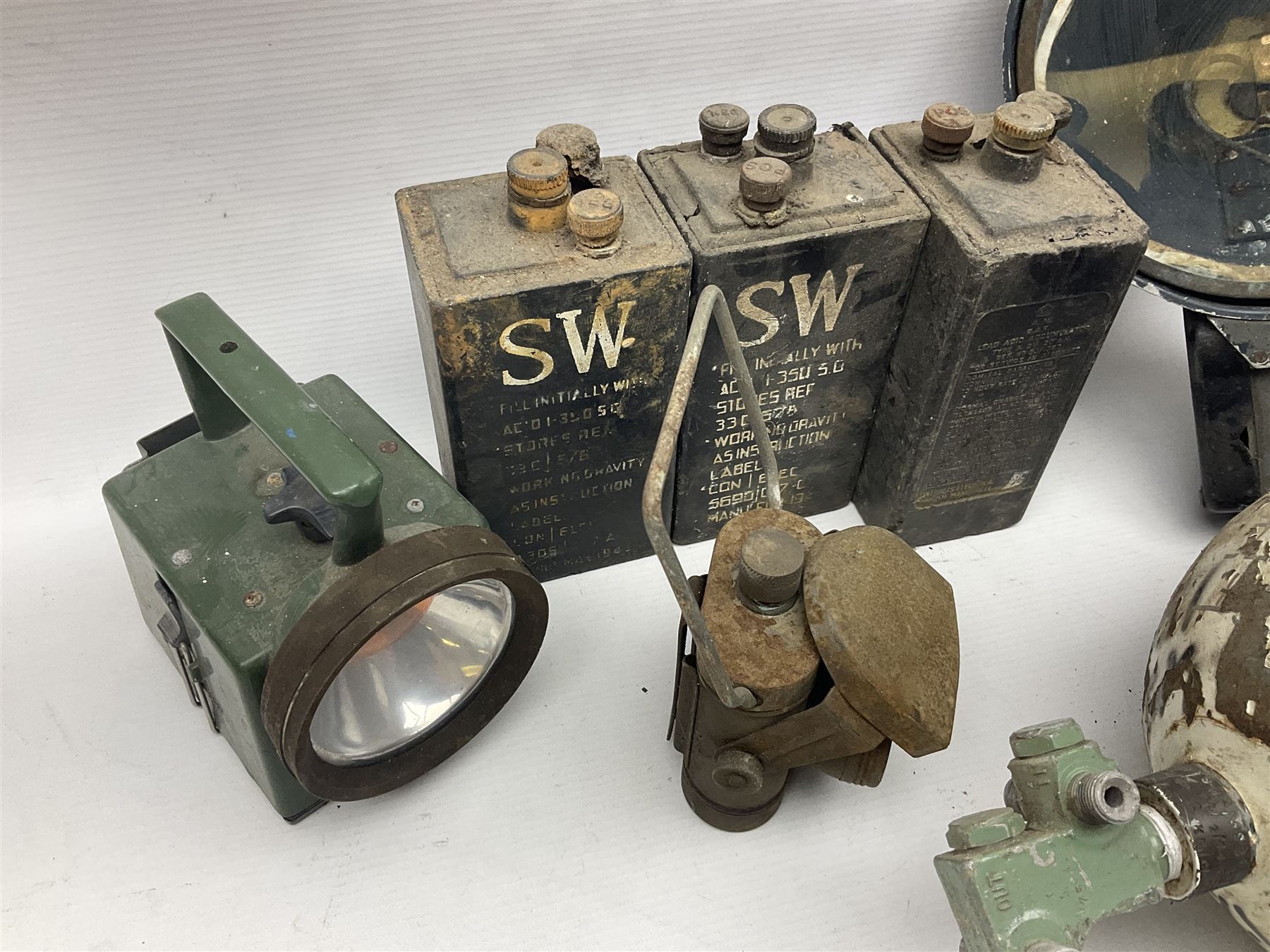 Three RAF light switches, together with military oxygen canister, batteries, gages etc  