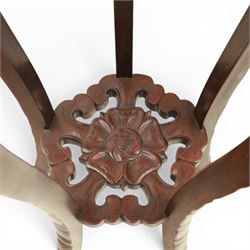 Chinese hardwood jardiniere stand, with inset black veined white marble, pierced carved apron united by rose carved undertier