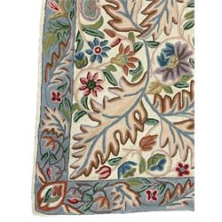 Crewel work wool chain wall hanging or rug, decorated with leaves and flower heads, the border with trailing floral pattern