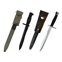 Swiss Model 1957 SIG rifle bayonet by Victorinox with 23.5cm steel blade numbered 389816; in plastic scabbard with leather frog stamped Zurcher Zurich 65 L38cm overall; and Spanish Model 1964 CETME rifle bayonet in plastic scabbard with webbing frog No.140666 (2)
