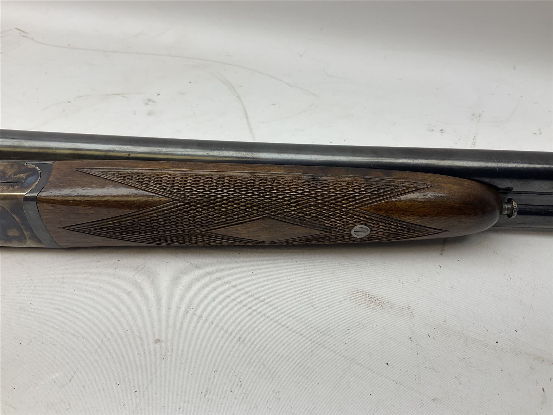 Spanish Ugartechea 20-bore double barrel side-by-side boxlock non-ejector sporting gun, retailed by Parker Hale Birmingham, with 67.5cm barrels, walnut stock with chequered grip and fore-end No.171199 L112cm overall SHOTGUN LICENCE REQUIRED