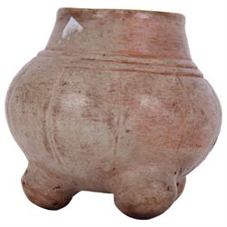 Maya pottery tetrapod bowl or jar, the cream glazed body of part ribbed bulbous form with short neck, upon three short feet, H10cm

With accompanying collectors note detailed 'Maya musical bowl, exceedingly rare cream glaze. Pre-Classic period Circa 400 AD.'
