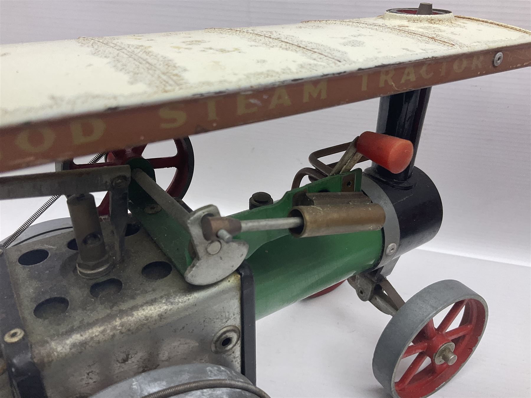 Mamod TE1a steam traction engine with burner, bunker, steering rod and funnel; red and black painted Tri-ang tin-plate Jones KL44 mobile crane; and two Hull Savings Bank Home Safe money boxes; all unboxed (4)