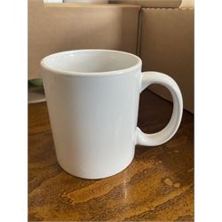 White ceramic same type mugs (100)- LOT SUBJECT TO VAT ON THE HAMMER PRICE - To be collected by appointment from The Ambassador Hotel, 36-38 Esplanade, Scarborough YO11 2AY. ALL GOODS MUST BE REMOVED BY WEDNESDAY 15TH JUNE.