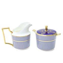 Wedgwood Anthemion Blue pattern tea service richly decorated in blue and gilt with palmette and colonnade forms comprising six cups and saucers, six plates, tea pot, milk jug and sugar box and cover