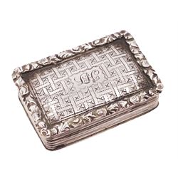 George III silver vinaigrette, of typical rectangular form, with raised foliate rim and engine turned decoration, with banded sides and foliate pierced engraving to gilt interior, hallmarked Birmingham 1797, maker's mark TS, L3cm