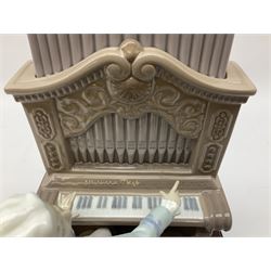 Lladro figure, Young Bach, modelled as a young Johann Sebastian Bach playing the piano, on a mahogany oval base, limited edition 2348/2500, in original box, no 1801, year issued 1994, year retired 1995, H29cm