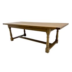 Rectangular solid light oak refectory dining table, with two additional leaves