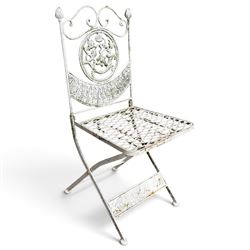 Three-piece French style white-painted wrought iron garden bistro set, comprising a circular folding table with latticework top and apron with scrolling foliate motifs (W70cm H80cm) and matching pair of chairs, with scrolling cresting rail and acorn finials over a scrolled foliate medallion, raised on lattice seat and folding X-frame base (W42cm H93cm)