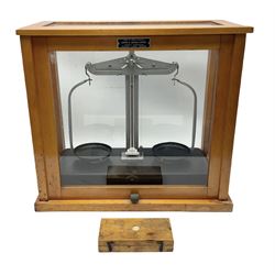Griffin & George set of laboratory scales in fully glazed hardwood cabinet with rise-and-fall front door L44.5cm H40cm; with beech box of brass weights by Philip Harris & Co Ltd