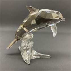 Swarovski Crystal sea creatures, comprising lion fish and dolphin, both with coloured elements, together with two seahorses, two small fish groups, butterfly fish, longnose butterfly fish and six coloured shells, tallest H8.5cm