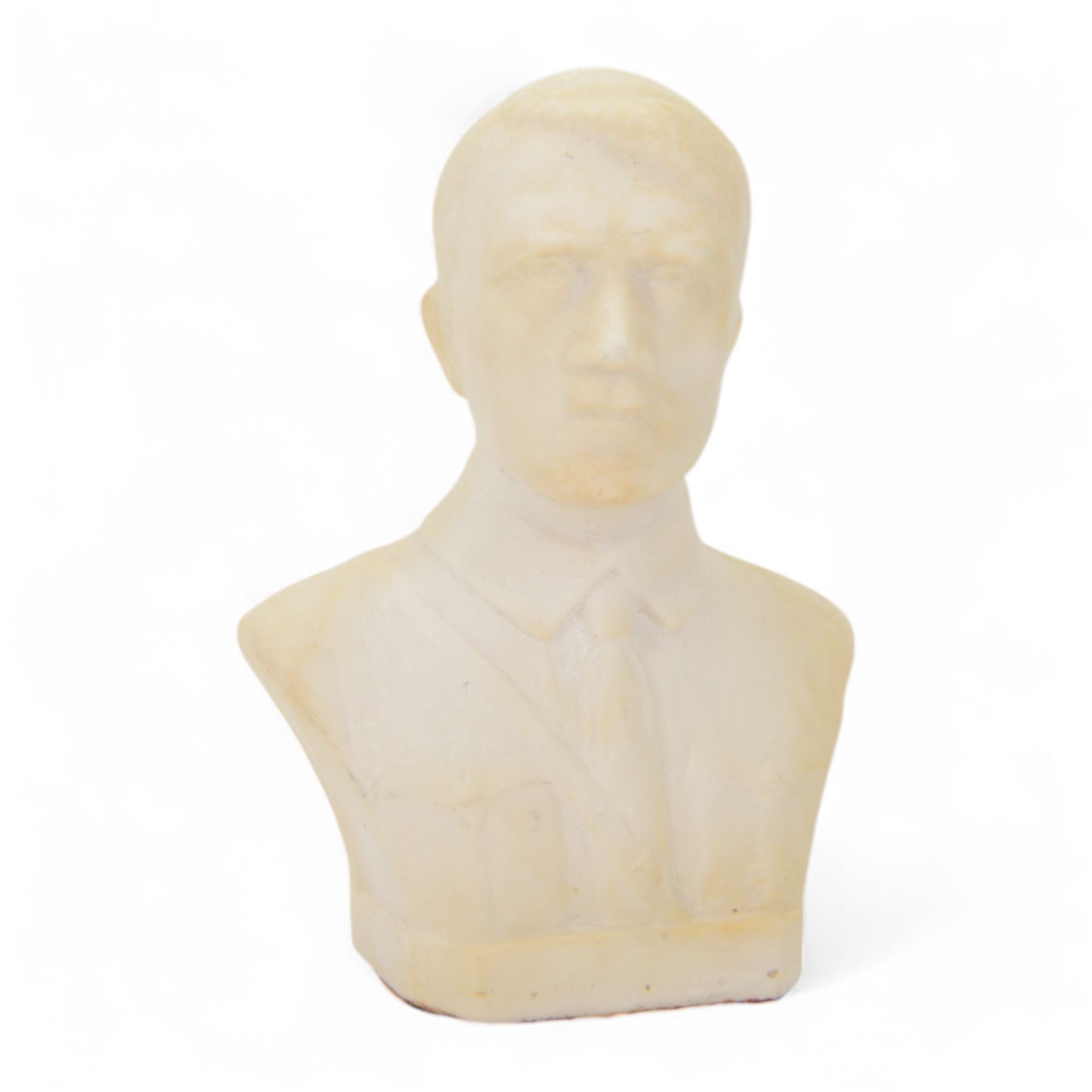 Composite cast bust of Hitler, together Third Reich Nazi German style desk stand depicting the national eagle and swastika on a black stone base, together with two other figures, bust H17cm 