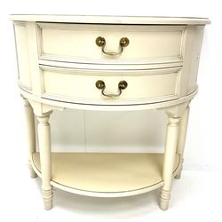 Cream painted finish Demi lune side table, two drawers, turned supports joined by solid undertier 