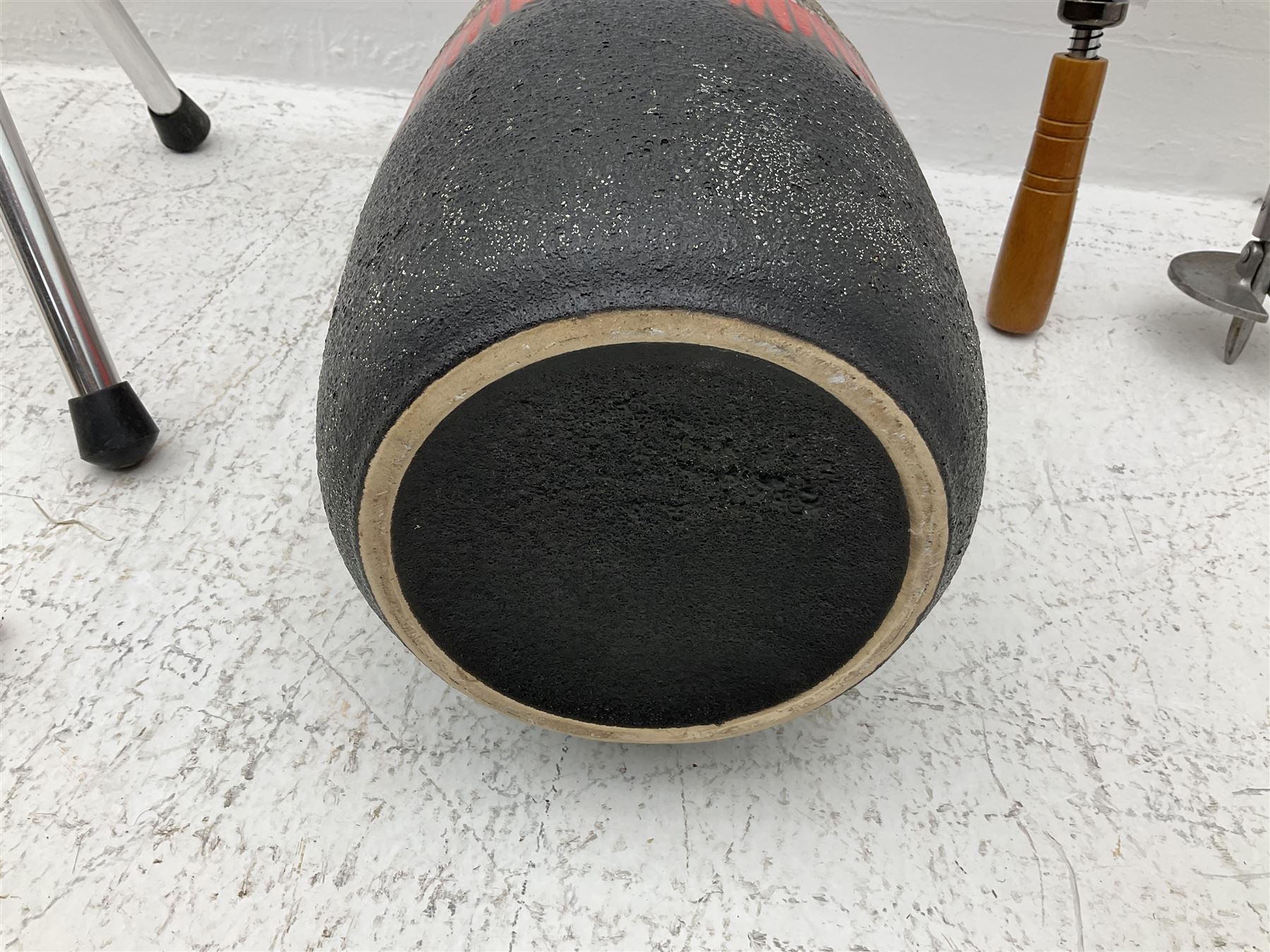 Two smooth polished ram horn handled Shepherd's crooks and a further similar example, together with various shooting sticks, walking sticks and canes, housed in a volcanic lava glaze West German style vase