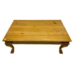 Rectangular pine coffee table, plank top with metal strapping, on paw feet