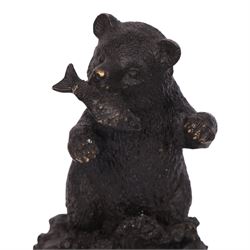 Bronze bear, upon a naturalistic base, with a fish in mouth, H17cm