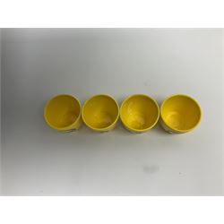 Limited edition Beatles Yellow Submarine teapot, designed by Paul Smith and made for Thomas Goode, 4/200, together with matching egg cups, 25/200, both in original boxes. 