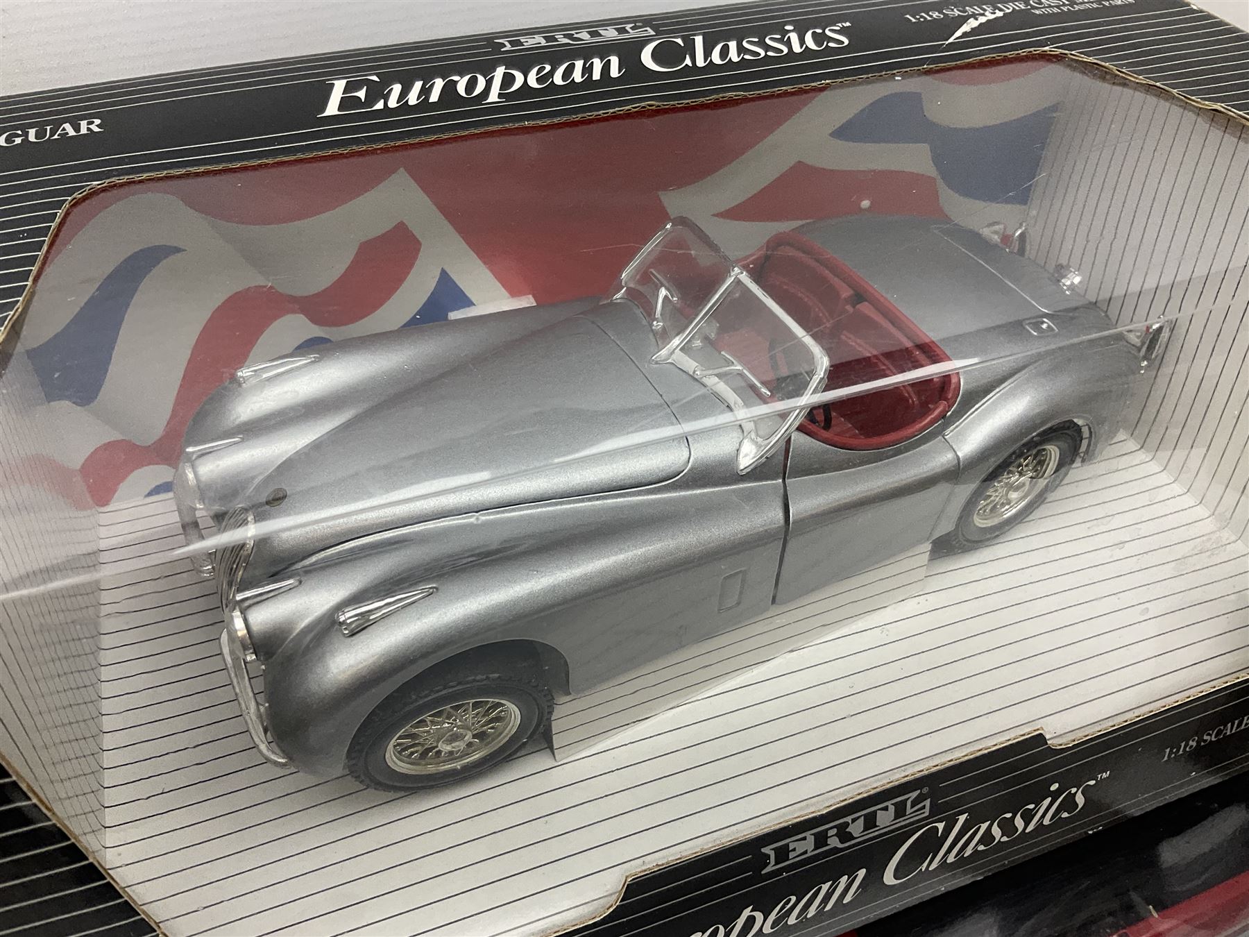 Ertl - three American Muscle 1:18 scale die-cast models comprising 1995 Dodge Ram 2500 SLT; '78 Dodge Lil Red Truck; and 1996 Firebird Trans Am; together with an Ertl European Classics 1:18 scale 1948 Jaguar XK120; all boxed (4)