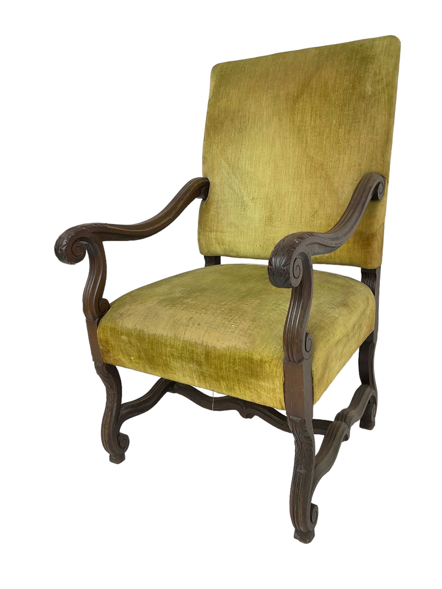 Early 20th century Carolean design mahogany framed throne chair, back and sprung seat upholstered in sage green fabric, scrolled amd reeded arms with carved oak leaf design, shaped supports with scroll feet united by waived stretchers