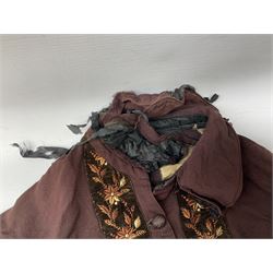 Victorian ladies riding habit, the two-piece construction in brown with embroidered floral velvet edging