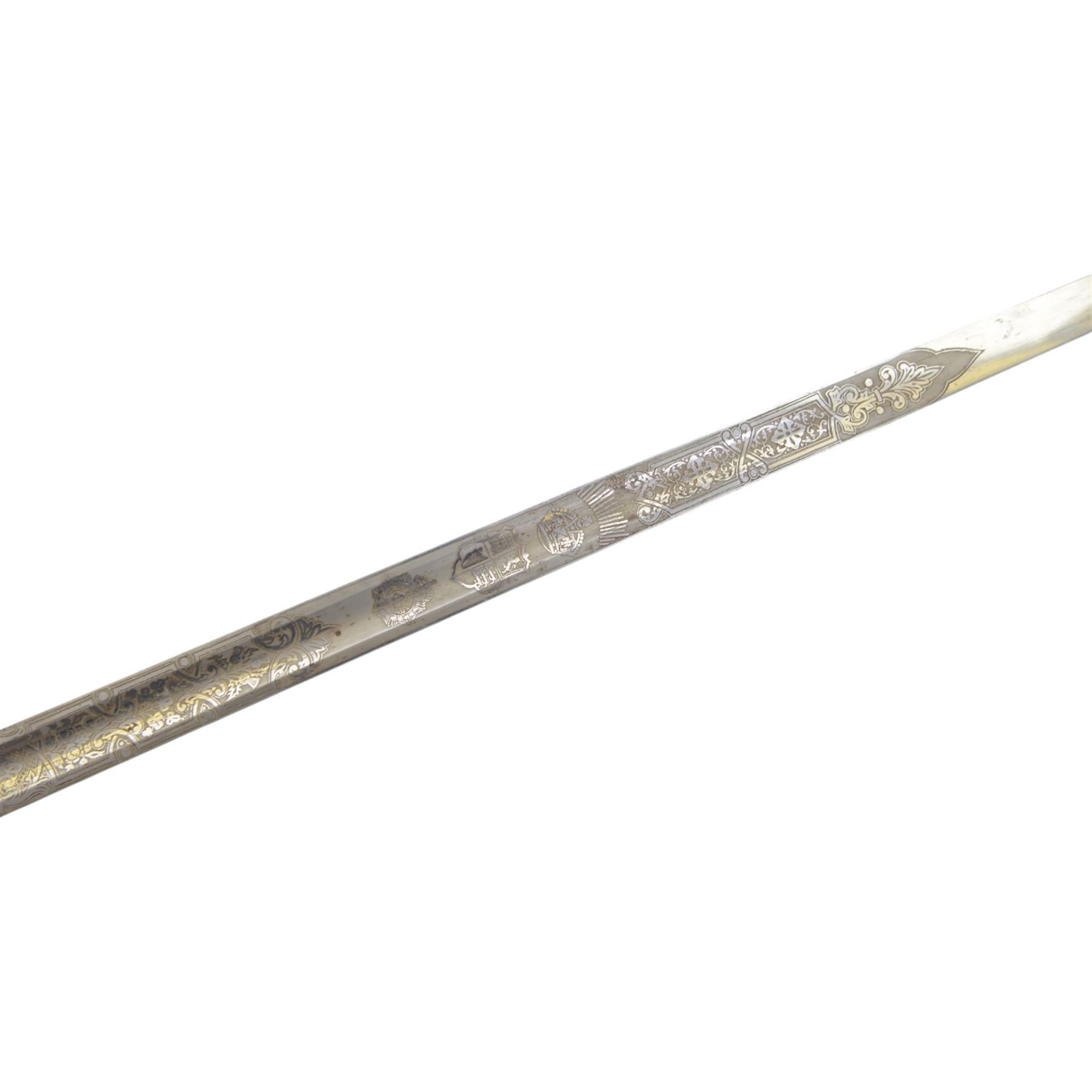 George V Canadian Army Service Corps (CASC) sword, made by Clement Gray Sheffield, the 89cm etched blade with GRV cyper and Royal Army Service Corps insignia makers mark 'Clement Grey Sheffield', numbered 6018 on spine, steel swept three bar hilt, shagreen covered grip, in steel scabbard with leather cover, overall L109cm