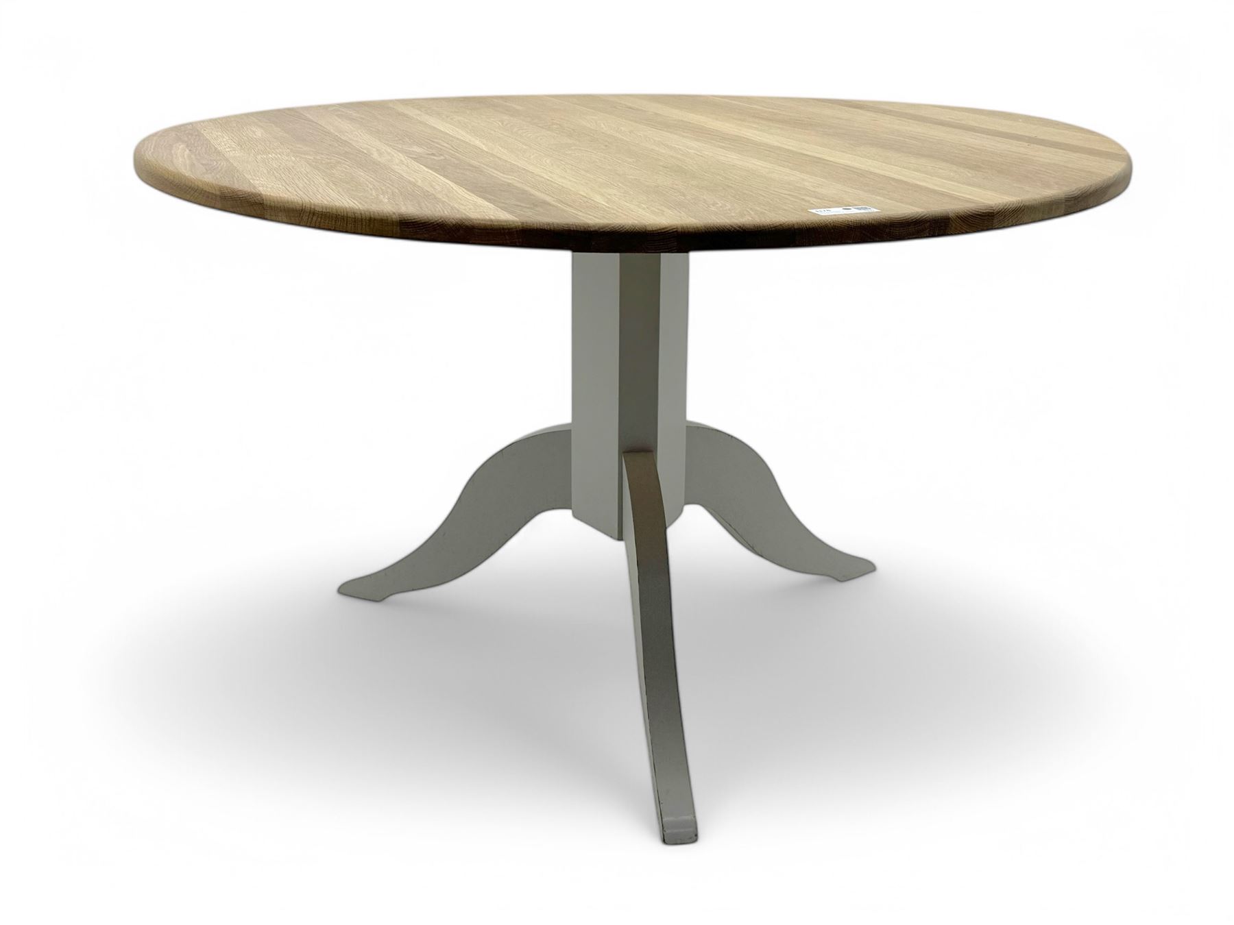 Contemporary Neptune 'Chichester' dining table, circular oak plank top over a grey painted pedestal base, raised on three curved supports