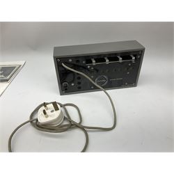 John Lennon interview recording conducted by John Hill student of Hull University on the 16th October 1964 at the A.B.C. Theatre Hull on behalf of the university newspaper 'Torchlight'. The interview lasts eight and a half minutes. It catches John in an upbeat breezy mood answering questions about the following topics: the song writing process ('sometimes you get an idea ....I dunno....my left leg.... and then write about that....'), recording (.... 'they just say - you're recording on such and such a date and they hope we turn up with some good songs written ....'), an alternative career path (.... 'I'd probably just have been a lay-about....'), failing at college (....'some other lads did my exams for me ....'), reading matter ( Clockwork Orange, Alice in Wonderland), his books of prose, tastes in music, the Blues, The Rolling Stones, being a Beatle vis-a-vis anonymity ('Whatever I'd be I'd choose to be rich .... who wants to walk down the street?').
The interview was recorded on 1/4 inch Emitape on a Fi-Cord Fidelity Recording machine. The reel-to-reel tape comes in its original Emitape plastic box and is accompanied by the Fi-Cord reel-to-reel machine on which the interview was originally recorded. Also included in this lot are a copy of the 'Torchlight' newspaper from 21st November 1964, two photographs of the interviewer with John Lennon (the interviewer is pictured to the left of John Lennon in the photograph in which John is signing a sketch) and one photograph of Paul McCartney with another reporter, the largest measures 12 x 16.5cm and a transcript of the interview. The recording is also accompanied by the original Fi-Cord tape recorder with microphone, four original 2v batteries and battery charger. The tape recorder has been adapted to take 3xAA batteries and the 2v battery charger is fitted with a standard UK 3-pin AC plug. The interview was recorded in the press room prior to the Beatles concert at the A.B.C. Theatre and is sold with copyright.