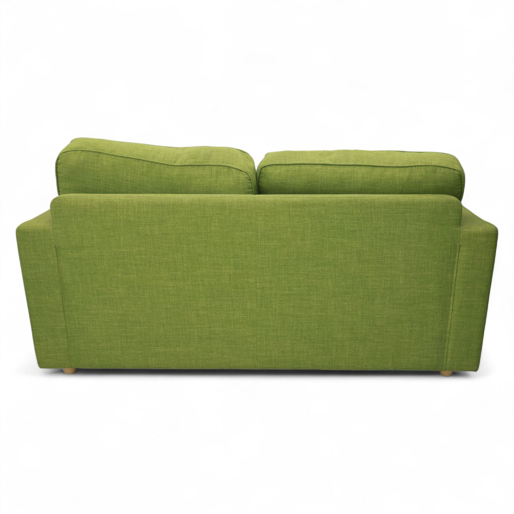Contemporary lime green upholstered sofa bed, with rectangular arms and two seat cushions, the back with two stitched backrest cushions, on low block feet