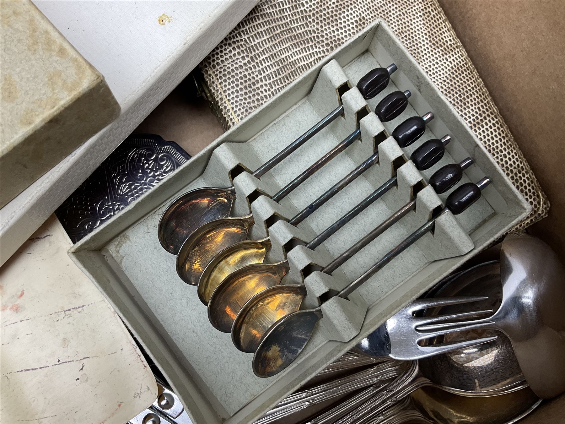 Set of four hallmarked silver teaspoons modelled on spoons from the Roman Imperial period, silver fork, and quantity of silver plated and other cutlery to include Walker & Hall, in two boxes
