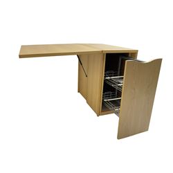 Skovby - 'SM101' drop leaf dining table, fitted with concealed storage compartment 