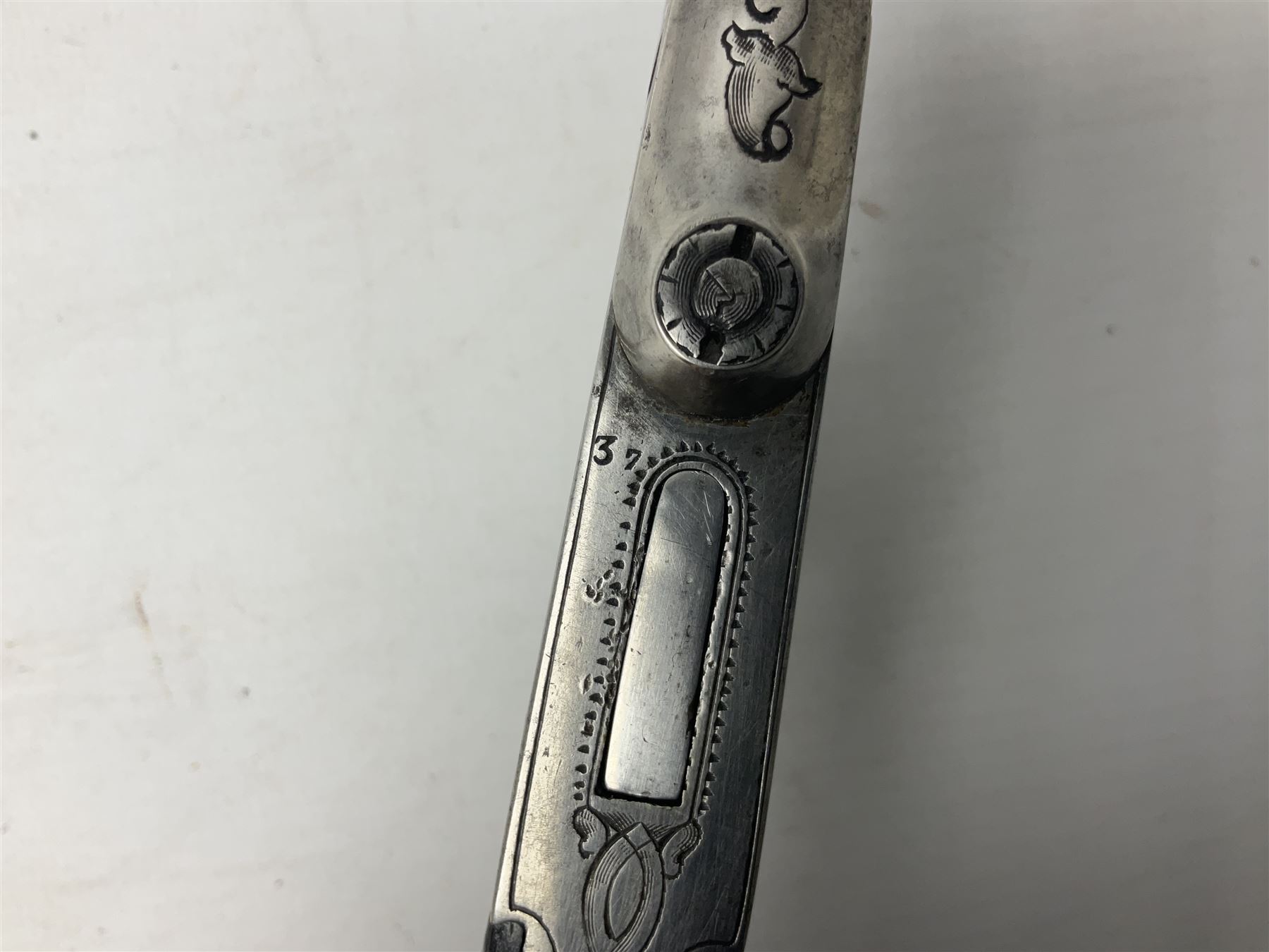 Mid-19th century French Boissy 12mm single barrel pin-fire pistol, the 9.5cm rifled barrel with brown stub twist damascus decoration, side screw under lever opening and English proof marks, retailed by H. Akrill Beverley, chased action with drop-down trigger and carved walnut stock L21cm