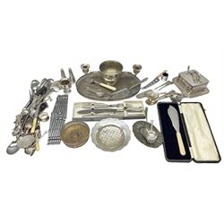 Quantity of silver-plate metalware to include butter dish with foliate engraved decoration, J.B. Chatterley & Sons cruet of tapering form with blue glass lined salt, Mappin & Webb, twin branch candelabra and flower bowl centrepiece, cutlery, etc