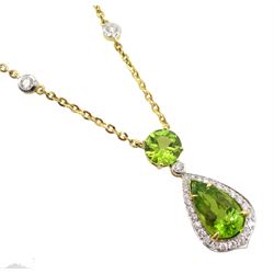 18ct gold peridot and diamond necklace, pear shaped peridot with diamond surround, suspended from a round brilliant cut peridot, on gold rubover set diamond chain, stamped 750, total peridot weight approx 4.65 carat