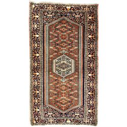 North West Persian Bidjar rug, orange peach ground extended field on indigo ground, decorated with floral Herati motifs, repeating waved border decorated with stylised plant motifs