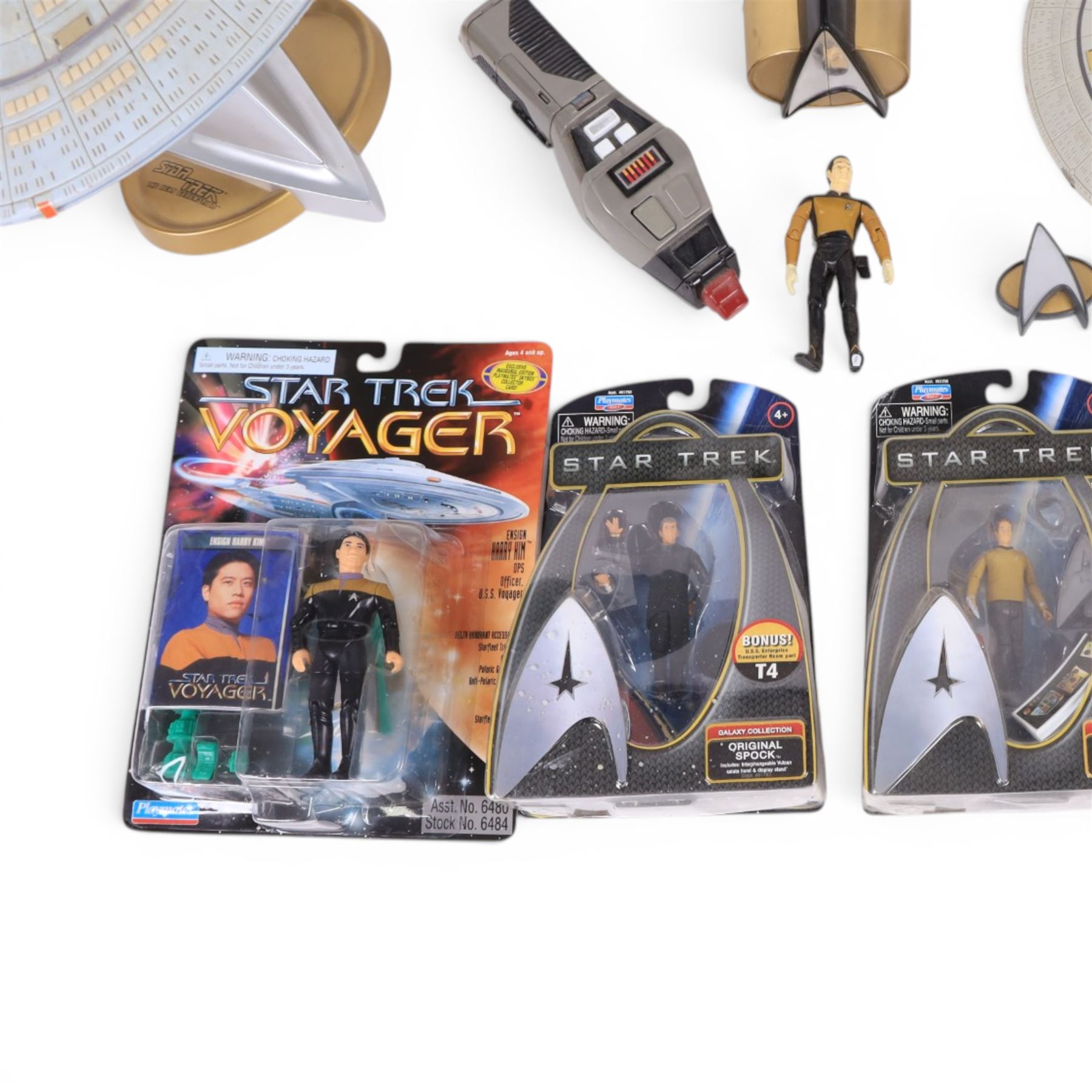 Four carded Playmates Star Trek figures, comprising Ensign Harry Kim, Galaxy Collection Kirk, Original Spock and Spock, together with a small collection of loose Star Trek models and star ships