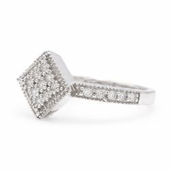 9ct white gold diamond shaped diamond ring, pave set with nine round cut diamonds, with diamond set shoulders, Birmingham 2006