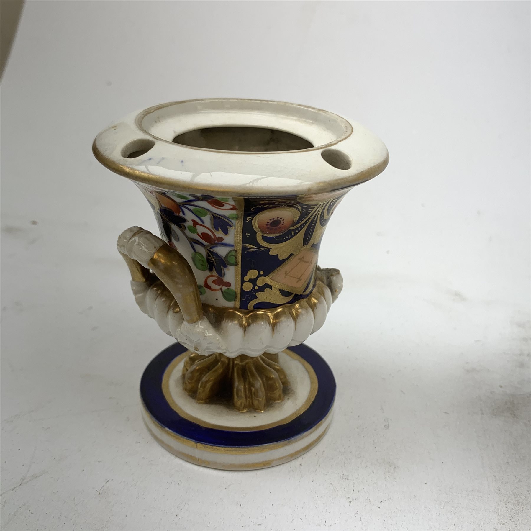 Three Bloor Derby Imari pattern twin handle urms, two examples with covers, each with mark beneath, H12cm, (all a/f), together with a pair of late 19th century Royal Crown Derby Imari pattern urns and covers, each with mark beneath, H13cm, (one significantly a/f). 